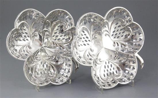 A pair of Edwardian silver “shamrock” sweetmeat dishes,